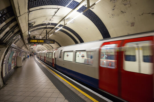London UK June 11th 2015 : A tube train leaving a London Underground station
