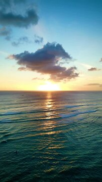 Sunset over the ocean horizon in Honolulu Hawai'i.