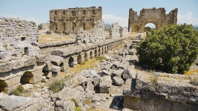 Ruins of the Nymphaeum and Bazilika of ancient city Aspendos. Turkey. High quality 4k footage