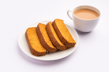 Fototapeta na wymiar Crispy cake rusk or Delhi toast with masala tea