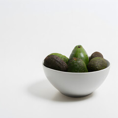 Bowl of Avocados in white bowl
