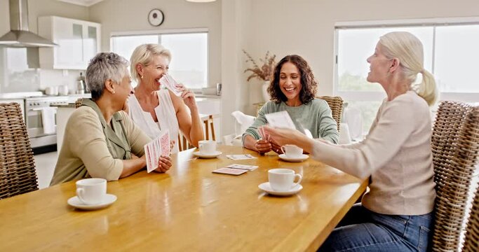 Senior people, retirement and playing cards with funny communication for holiday free time together at home table. Excited elderly group of people with card games talking, debate and chat rules