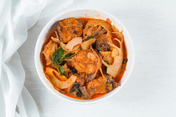 Red curry with catfish and preserved bamboo shoot, Red curry with coconut milk, Thailand tradition red curry soup.