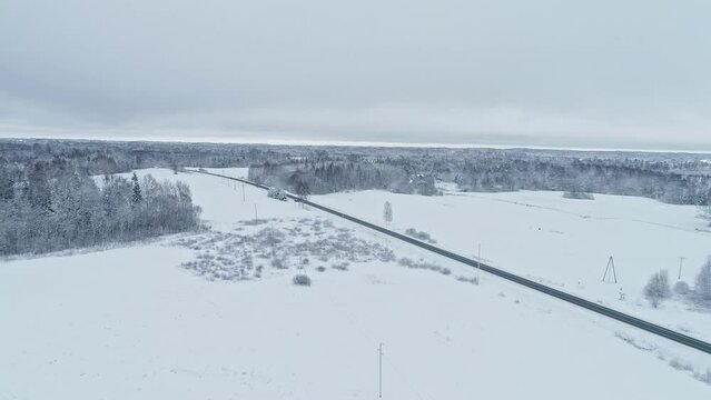 Snow layered Rovaniemi Finland outskirts highway aerial 