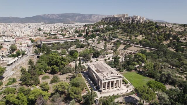 Aerial view of the temple of Hephaestus in Ancient Agora, Acropolis hill in Background, Athens