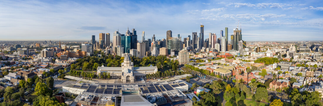 Aerial panoramic views of the beautiful Melbourne Exhibition building in Carlton, with the cbd in the background