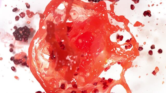 Slow Motion of Explosion Pomegranate Seeds and Burst Red Juice