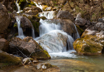 Fototapeta premium detail of waterfall on mountain canyon