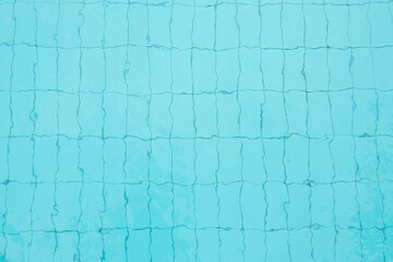 Swimming pool bottom caustics ripple and flow with waves background and Summer background