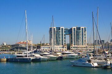 Yacht Marina Herzliya Israel. Pier where sailing boats are moored. Traveling on a sailboat, sea holidays, rent and charter of yachts.