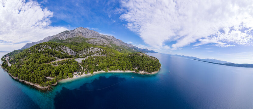 Duba plaza nearby Igrane village on Makarska riviera and Biokovo mountain aerial view, Dalmatia region of Croatia