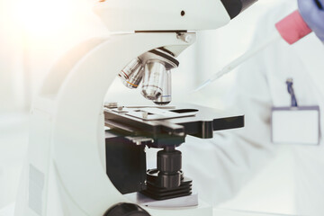 microscope on the table in the biological laboratory.