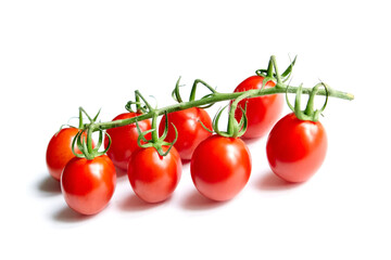 Cherry tomatoes cluster isolated on white. Fresh vegetable. Red cherry tomatoes on stem