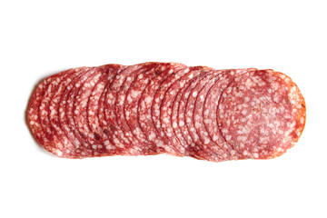 Thin sliced salami sausage isolated on white. Thin sliced italian dry salame, top view