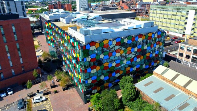 Modern building called One Smithfield with coloured glass cladding in Hanley, UK