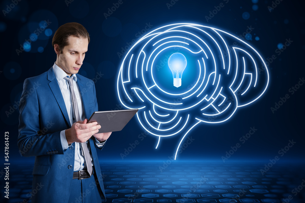 Poster businessman using tablet with abstract digital light bulb with human brain inside glowing on blurry 
