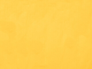 Golden yellow linen fabric texture close-up of natural cotton decorative canvas background