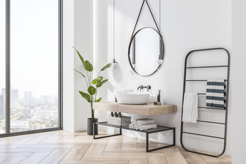 Perspective view on modern bathroom interior design with wooden sink cabinet, parquet floor, city view from panoramic window and green plant on white wall background. 3D rendering