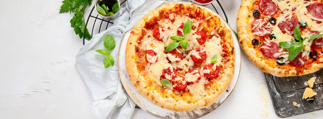 Freshly baked pizza on dark background.