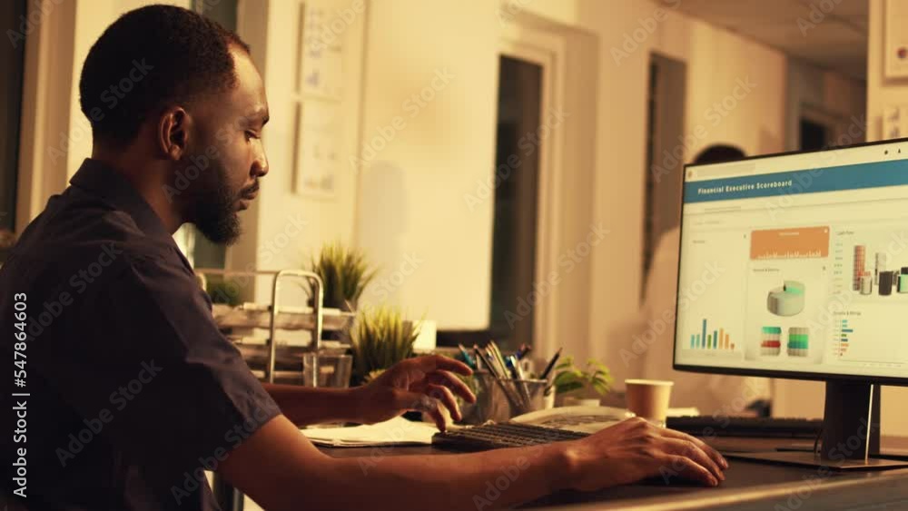 Poster african american worker analyzing company data on computer to plan research and presentation. workin