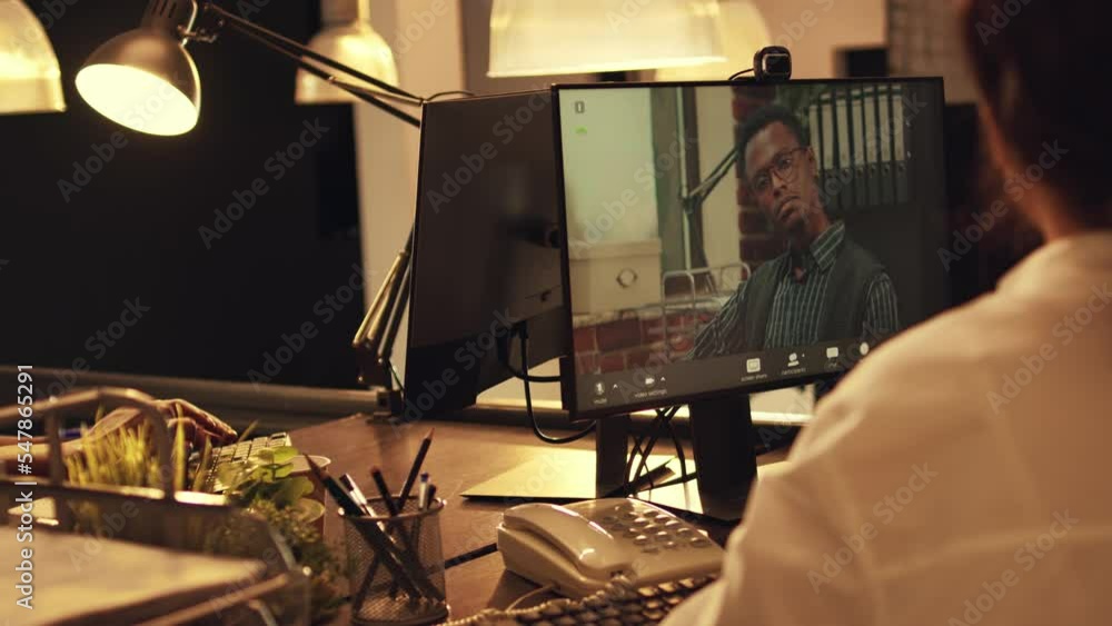 Aufkleber freelancer talking to man on remote videoconference call, using webcam on computer to attend telecon