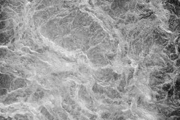 Churning water. Turbulence on the water surface. Troubled water as a background.
