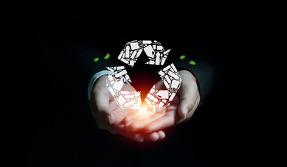 Businessman hand holding ECO recycle icon, Environmental sustainability and reduce pollution concept, Sustainable strategy to eliminate waste and pollution for future