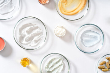 Alternative natural medicine and glassware, flasks and petri dish. Alternative medicine herbs. Natural beauty skin care products.