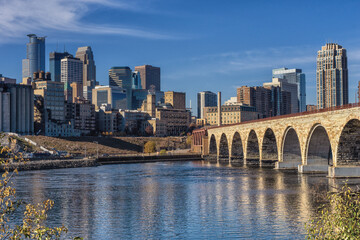 Fototapeta na wymiar Downtown Minneapolis, Minnesota as seen from the famous stone arch bridge