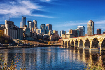 Fototapeta na wymiar Downtown Minneapolis, Minnesota as seen from the famous stone arch bridge