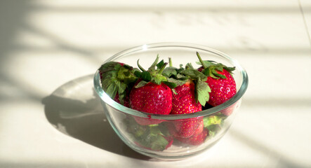 Fresh and Juicy beautiful organic strawberries on wooden background. Top view point.