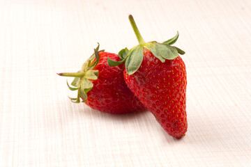 Fresh and Juicy beautiful organic strawberries on wooden background. Top view point.
