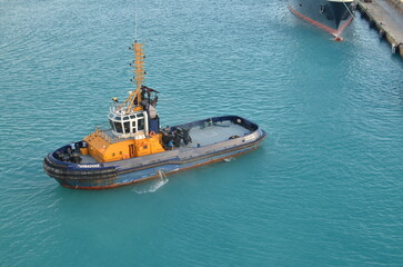 Tug Boat in Caribbean Harbour Port Blue Water Top View