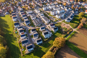 Germany, Baden-Wurttemberg, Waiblingen, Aerial view of modern energy efficient suburb in autumn