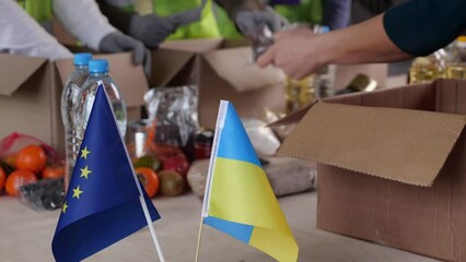 EU assistance to Ukraine. European volunteers collect food, warm clothes, shoes, medicines, personal hygiene and body care items for Ukrainians in need - Powered by Adobe