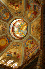 Fototapeta na wymiar POCHAIV, UKRAINE: Lavra Orthodox Christian Monastery Complex Transfiguration Cathedral Interior Cupola Ceiling Fresco of God Jesus Christ