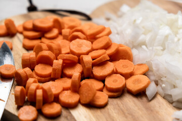 Chopped carrots and onions. Preparation for cooking.