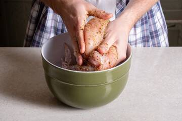 Raw pickled chicken wings. Raw chicken in spices. Cooking chicken wings