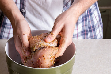 Raw pickled chicken wings. Raw chicken in spices. Cooking chicken wings
