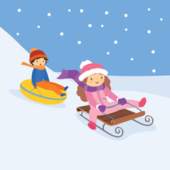The girl goes down the hill on a sled. Behind her, the boy descends on an inflatable circle