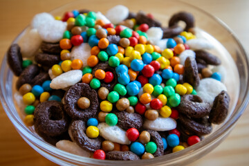 Useful healthy dry breakfast in bowl. Food for kids. Cereals, multicolored balls