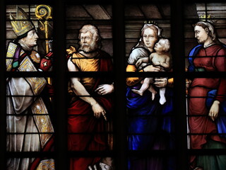 Obraz premium Amsterdam Oude Kerk Church Stained-Glass Window Detail Depicting Holy Mary Holding Baby Jesus, Netherlands