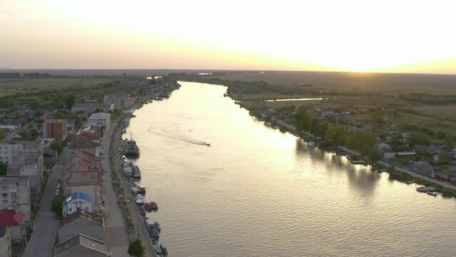 Aerial view of Chilia old town and the port on the Kilya waterway on Danube river. Danube delta Romania. The port of Chilia. Maritime navigation arm and border point. Chilia Veche, Romania and Ukraine