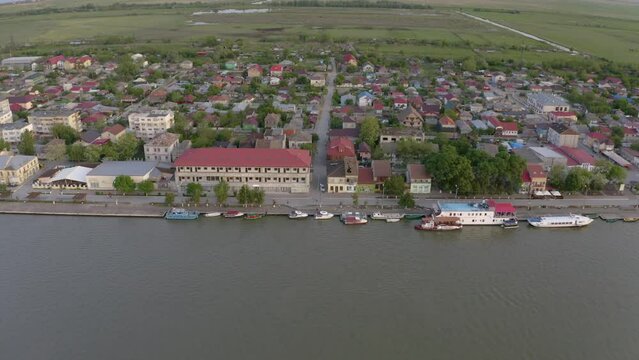 Aerial view of Chilia old town and the port on the Kilya waterway on Danube river. Danube delta Romania. The port of Chilia. Maritime navigation arm and border point. Chilia Veche, Romania and Ukraine