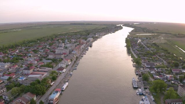 Aerial view of Chilia old town and the port on the Kilya waterway on Danube river. Danube delta Romania. The port of Chilia. Maritime navigation arm and border point. Chilia Veche, Romania and Ukraine