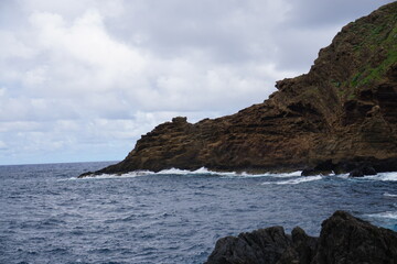 Fototapeta na wymiar The cliff, reef and sea