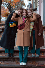 smiling mom and daughters