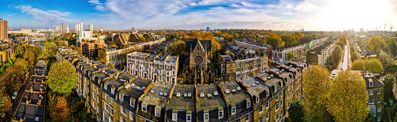 Aerial view of church and residential area in West London in autumn, England