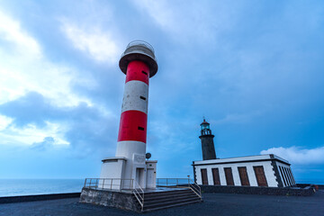 Wide angle bottom view of old and new lighthouse