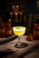 glass with drink in night bar. gourmet handcrafted cocktails